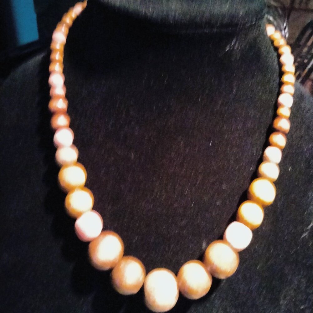 Necklace made with wooden beads -  darker brown in person than in photos
